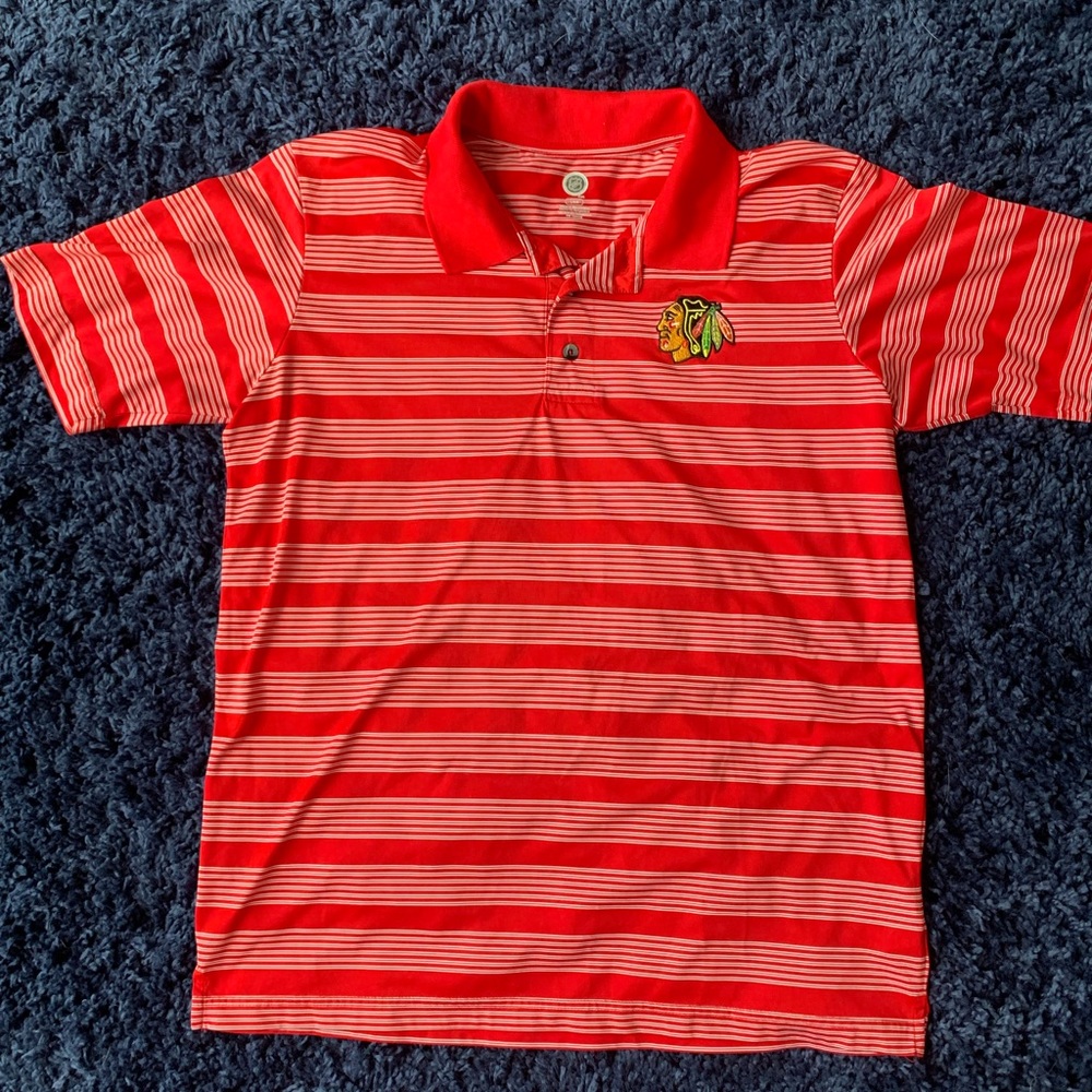 Men’s NHL Chicago Blackhawks golf polo- size Large, red with white stripes.